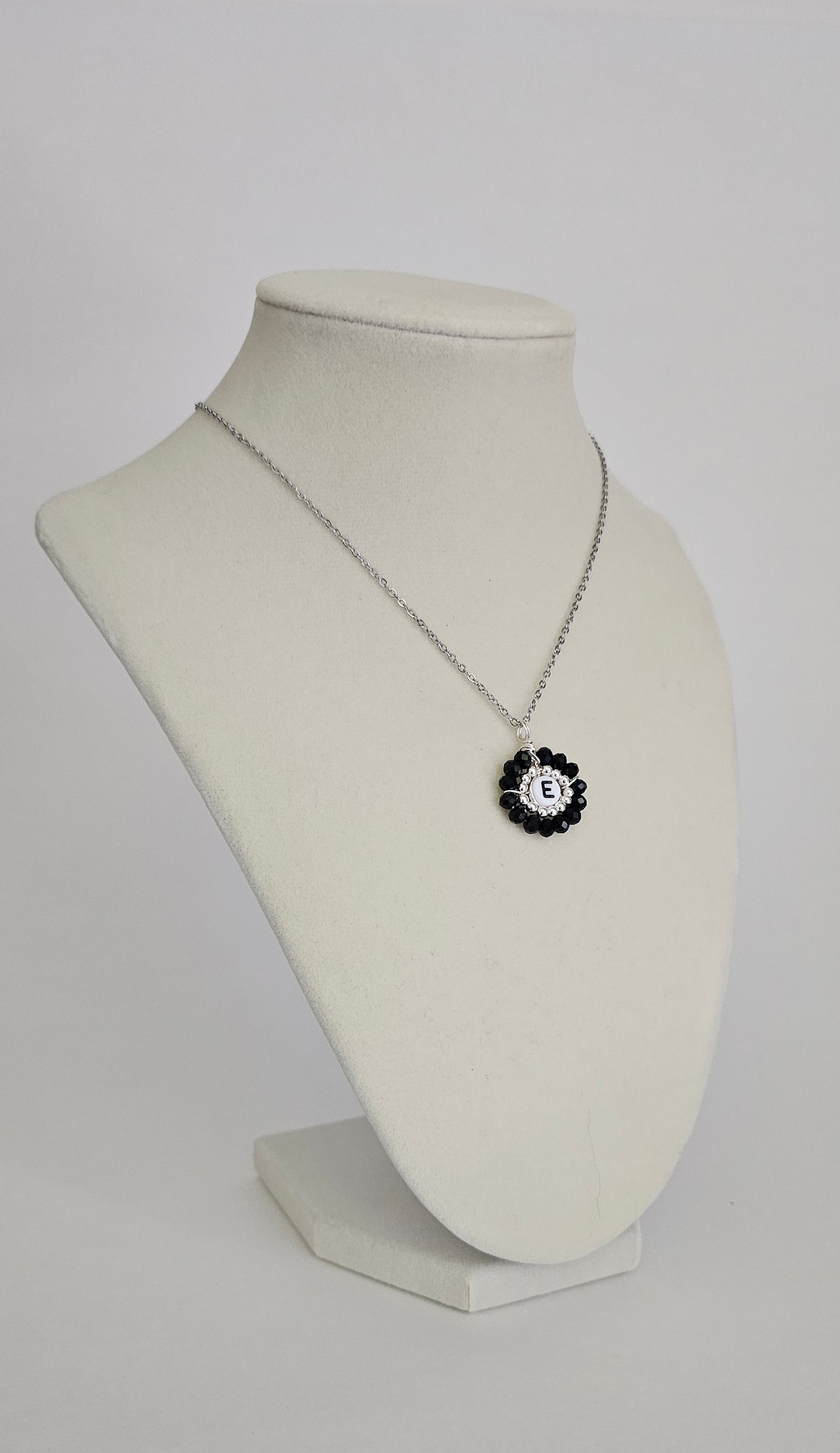 Letter charm necklace silver and black
